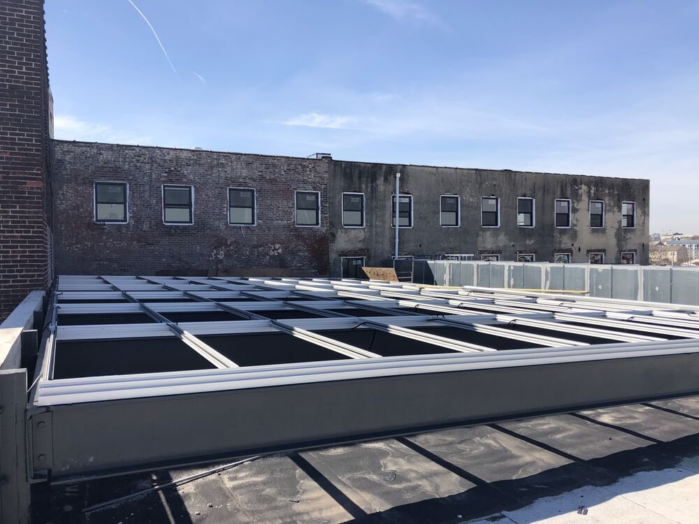A new skylight frame being set into the roof at Billy Penn Studios, Philadelphia