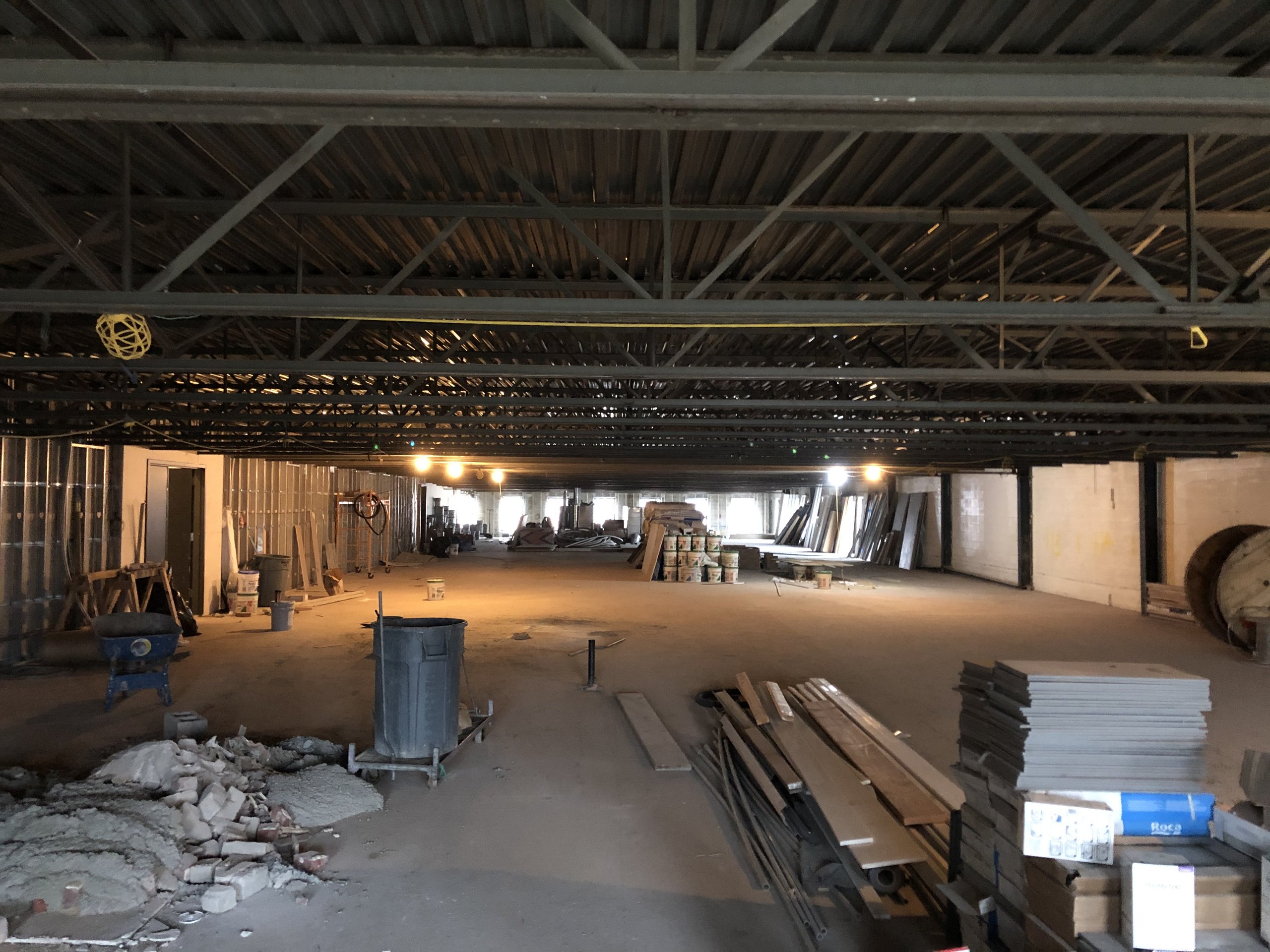 The coworking space at Billy Penn Studios before renovation, an empty industrial floor