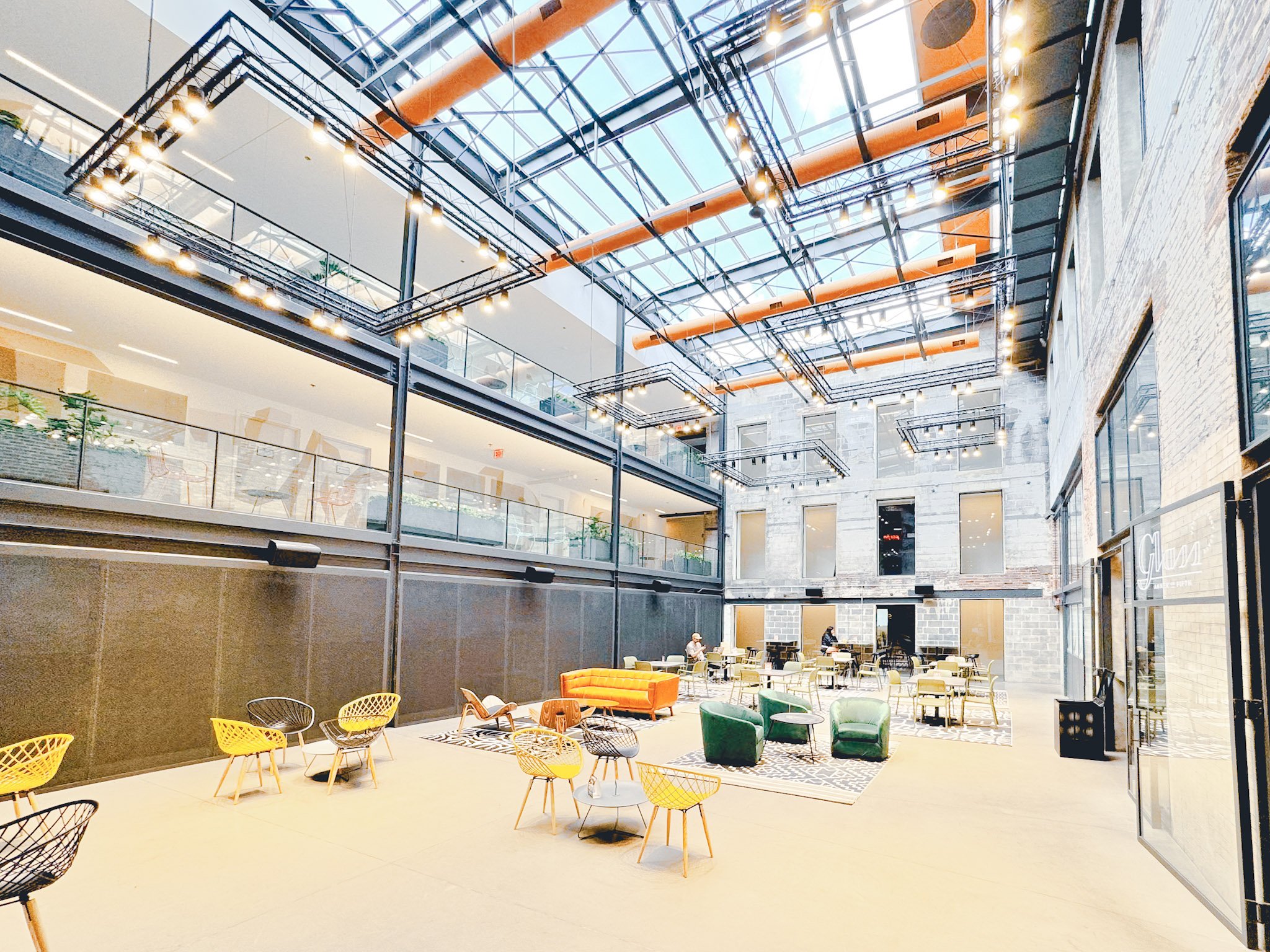 The planted atrium at Billy Penn Studios, under the skylights