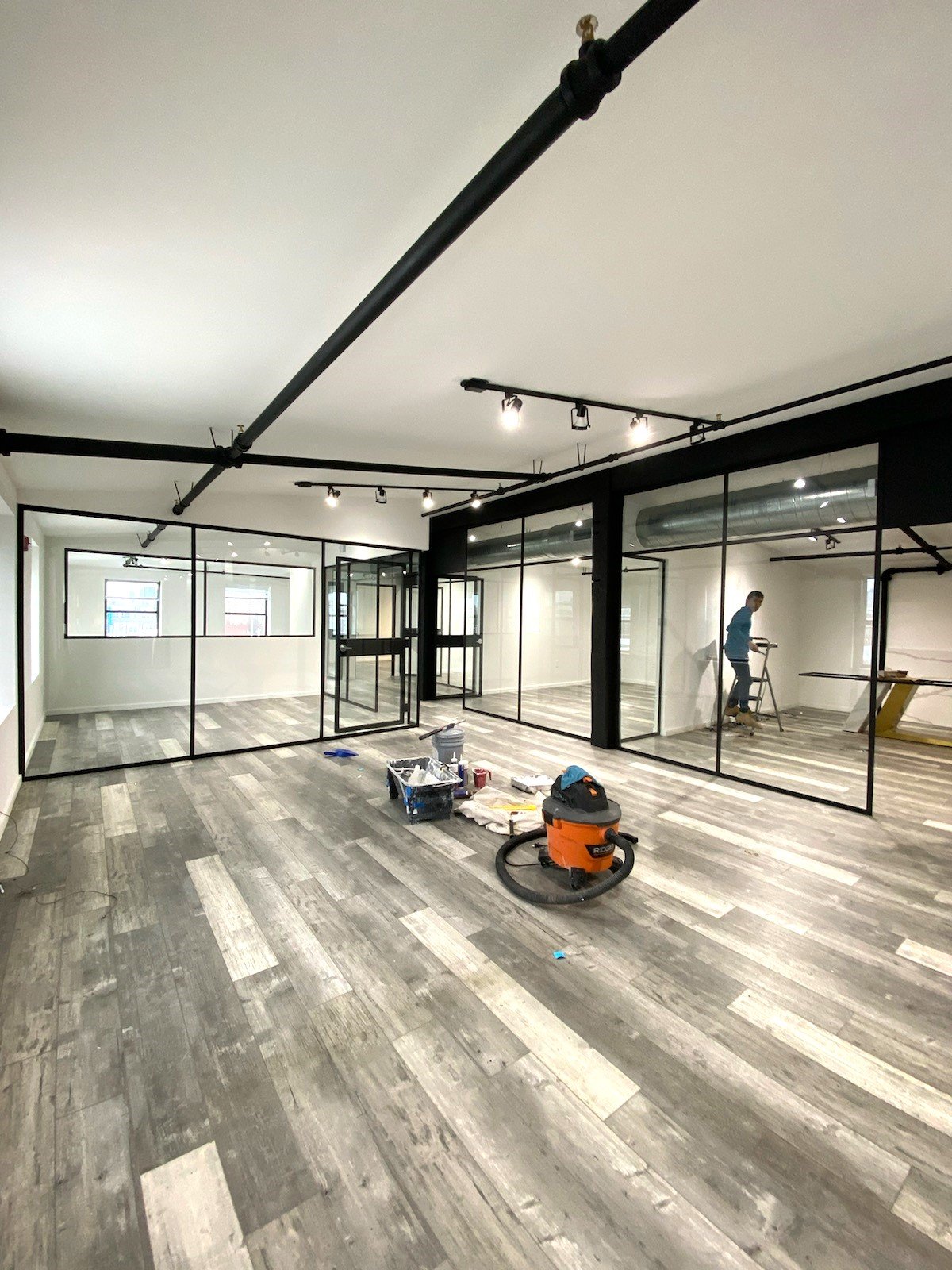 Custom glass and steel partitions fabricated on site at Billy Penn Studios