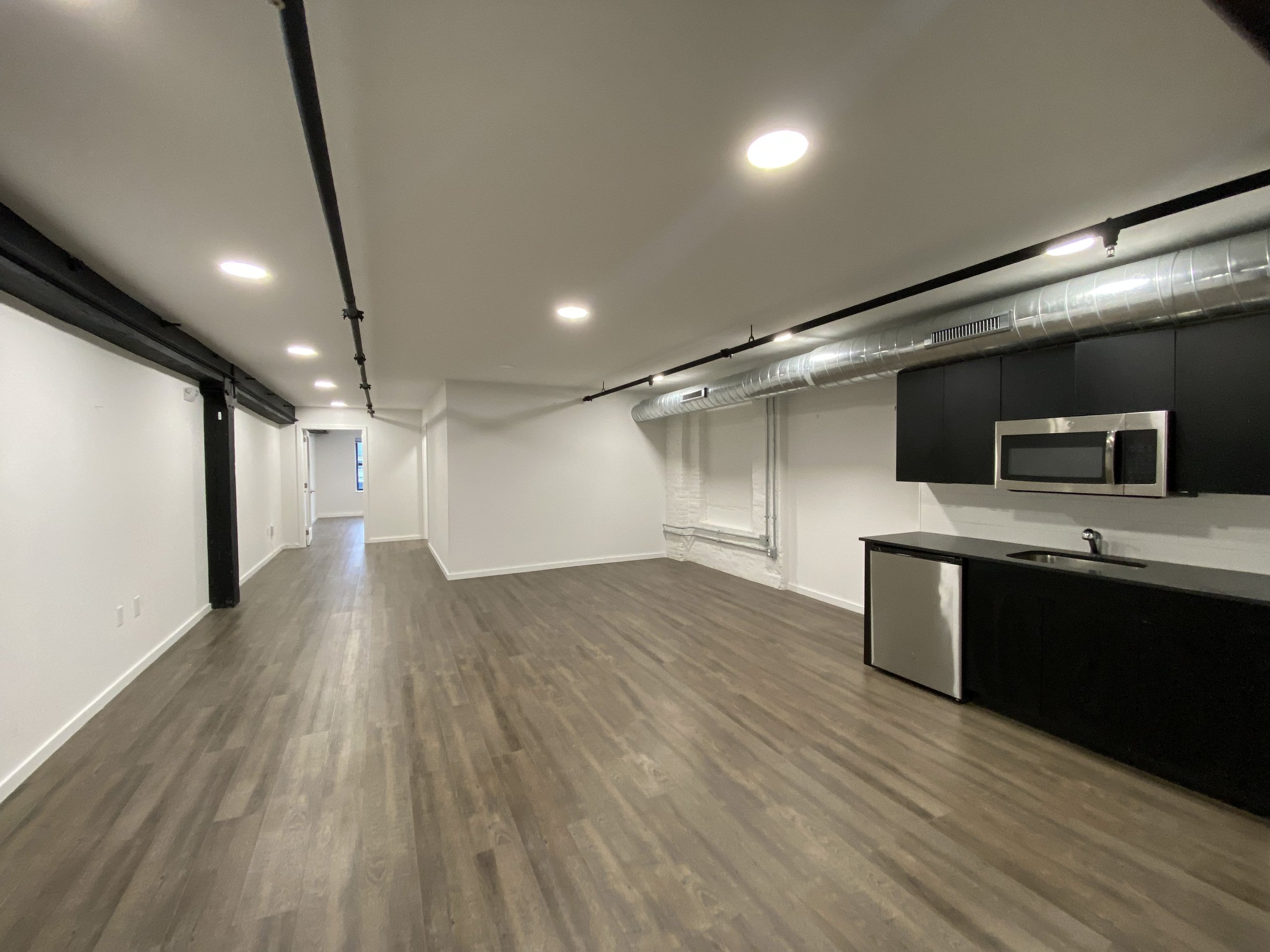 An office at Billy Penn Studios fitted out with plumbing and a kitchen