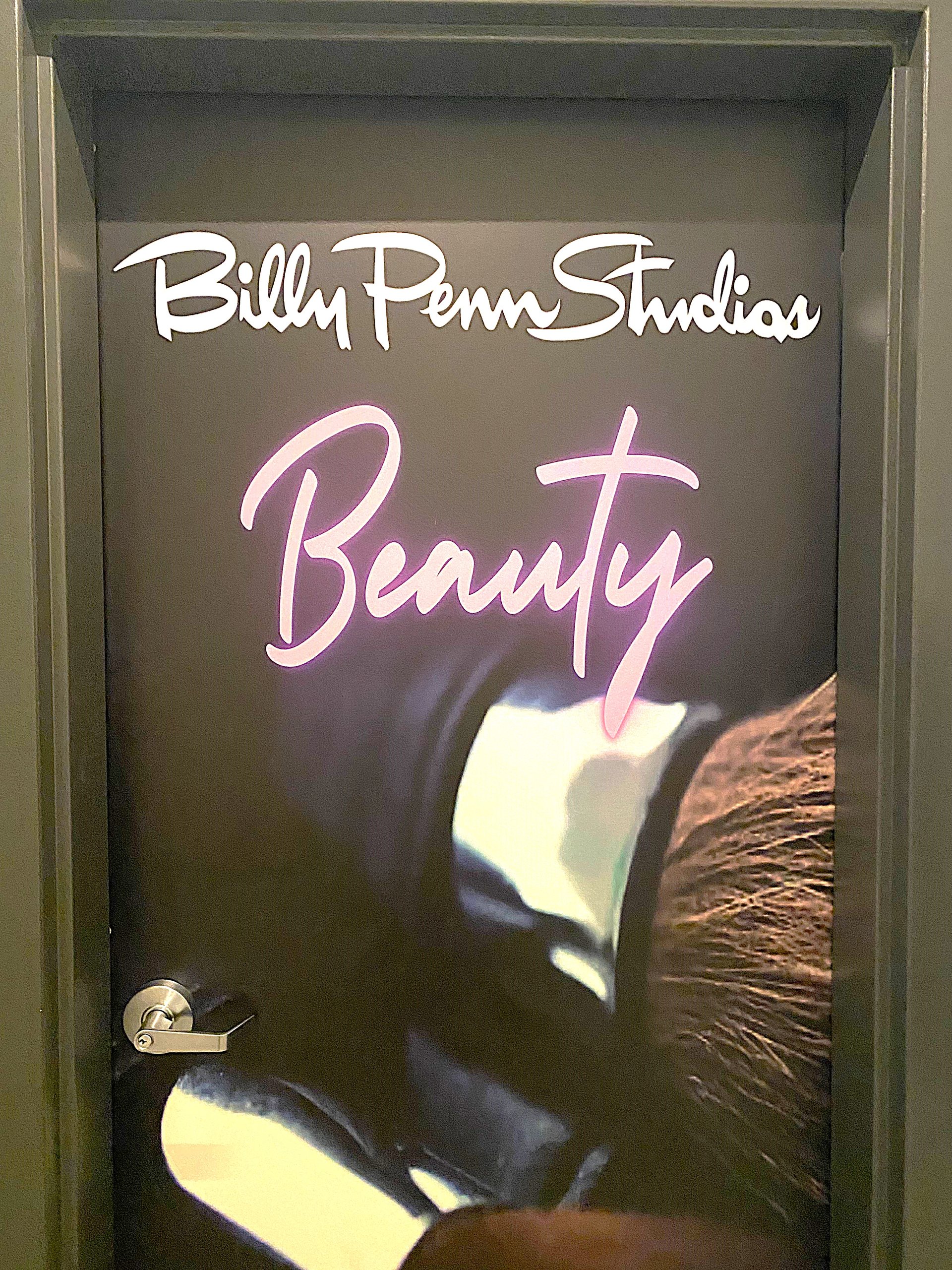 A suite door sign in the beauty wing at Billy Penn Studios